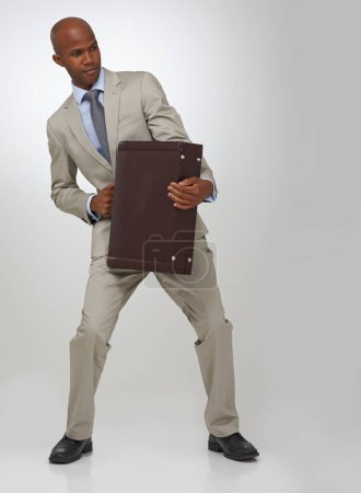 Photo for Businessman, briefcase and studio as professional lawyer or prepared for opportunity, corporate or growth. Black person, suit and white background or employee ready for employment, career or mockup. - Royalty Free Image