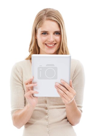 Photo for Woman, portrait and smile with tablet in studio to scroll website, update social media post and search blog on white background. Happy model, digital technology and online shopping to download ebook. - Royalty Free Image
