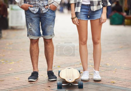 Photo for Skateboard, legs and urban couple of friends ready for travel ride, outdoor exercise or skills training in city. Active, cardio fitness and feet of skateboarder for street journey, practice or skate. - Royalty Free Image