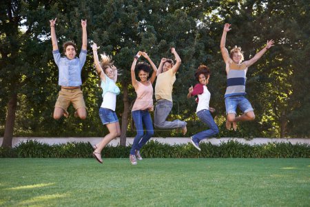 Photo for Group, friends and portrait or park jump for fun connection, summer outdoor or happy. Man, woman and university students or celebration leap in nature for study achievement, college unity or sunshine. - Royalty Free Image