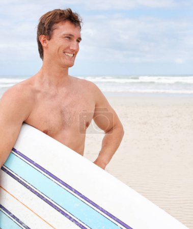 Photo for Thinking, smile and body of man with surfboard at beach on blue sky for sports, travel or fitness. Nature, vision and happy young shirtless surfer on sand by ocean or sea for exercise and training. - Royalty Free Image