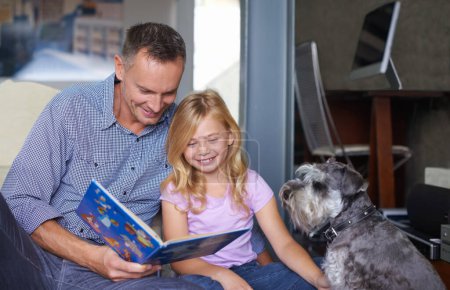 Photo for Father, child and reading book for learning at home, story and fantasy fiction for education. Daddy, daughter and dog bonding together, literacy and storytelling for language development or growth. - Royalty Free Image