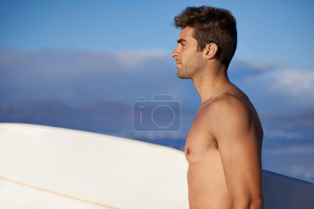 Photo for Thinking, surfing and man with surfboard by ocean for, waves on summer vacation, weekend and holiday by sea. Travel, nature and person on beach for water sports, adventure and hobby in Australia. - Royalty Free Image