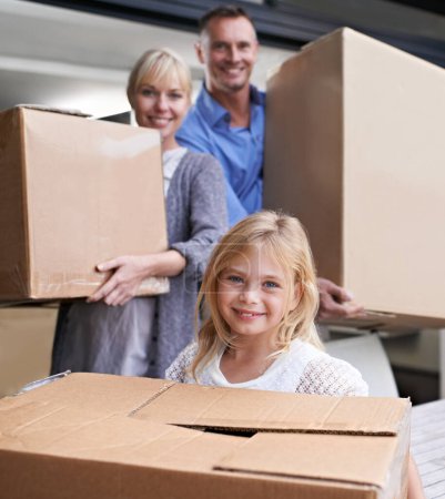 Photo for Portrait of happy family moving to home with boxes, package and mortgage on property investment. Man, woman and girl child together in new house, real estate and love with future, cardboard and smile. - Royalty Free Image