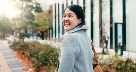 Photo for Walking, city and Japanese business woman with smile for morning commute, journey and travel to work. Professional, corporate and portrait of happy person in urban town for career, working and job. - Royalty Free Image