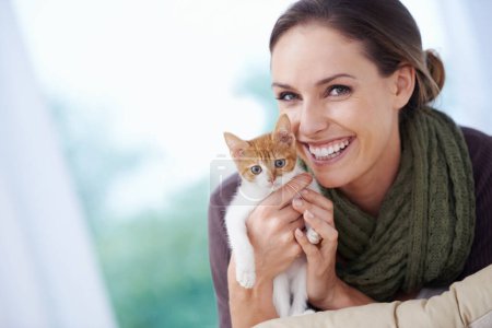 Photo for Happy, pet and portrait of woman with kitten in home for bonding, friendship and relax on sofa. Animal care, house and person with adorable, cute and young cat on couch for playing, embrace and love. - Royalty Free Image