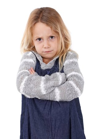 Photo for Girl, child and angry in portrait with arms crossed, frustrated and stress, emotion and frown on white background. Youth, upset or disappointed with tantrum, bad attitude with problem in studio. - Royalty Free Image