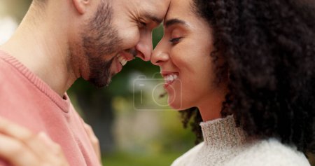 Photo for Forehead, nature and couple with love, smile and relationship with happiness, romantic and bonding. Romance, man and woman outdoor, dating and marriage with loving together, support and commitment. - Royalty Free Image