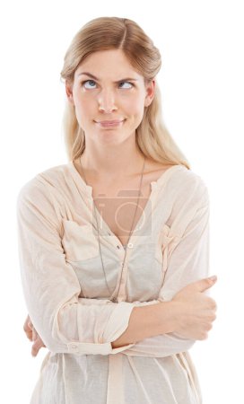 Photo for Funny face, crazy and squint with woman arms crossed in studio isolated on white background for humor. Emoji, comedy and confident young comic feeling silly, goofy or quirky with weird body language. - Royalty Free Image