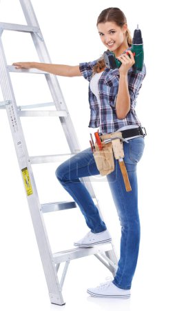 Photo for Woman, portrait and ladder or drill as construction worker or handyman for building, maintenance or power tools. Female person, face and studio on white background for improvement, project or mockup. - Royalty Free Image
