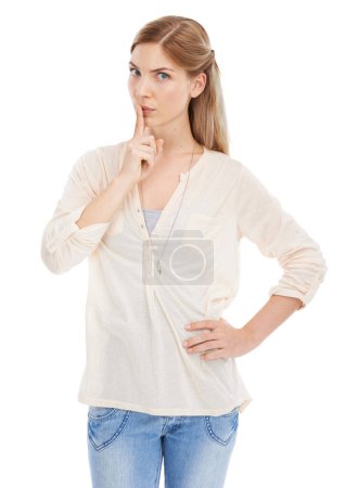 Photo for Whisper, portrait and woman with finger on lips in studio for noise sign on white background. Face, hands and female model with emoji expression for confidential secret, gossip or hush news gesture. - Royalty Free Image