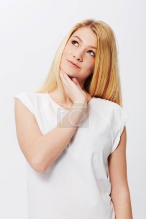 Photo for Portrait, beauty or woman thinking of skincare, cosmetics and dermatology on white background. Face, female person or confident model with mockup, ideas and glow with wellness or aesthetic in studio. - Royalty Free Image