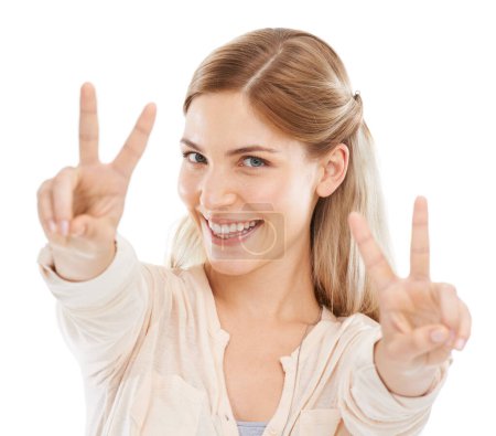 Photo for Excited, peace sign and portrait of woman in studio isolated on a white background. Face, fingers and v hand gesture, emoji and happy young model with funny symbol for victory, success and winning. - Royalty Free Image