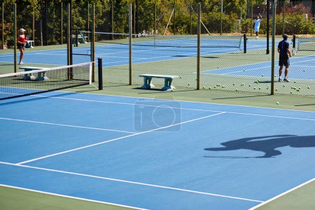 Photo for Floor, sports or people on tennis court for training, outdoor exercise or competitive match in summer. Shadow, athletes or workout for health or fitness with wellness on the ground ready for a game. - Royalty Free Image