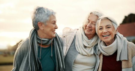 Photo for Comedy, laughing and senior woman friends outdoor in a park together for bonding during retirement. Portrait, smile and funny with a happy group of elderly people bonding in a garden for humor or fun. - Royalty Free Image