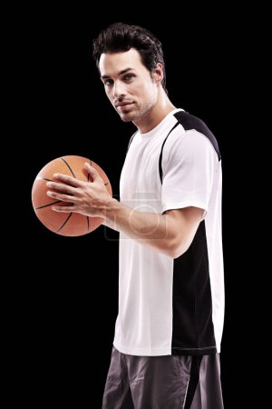 Photo for Sports, basketball and portrait of fitness man with ball in studio for training, wellness or fun hobby on black background. Workout, face and male athlete with handball match, workout or performance. - Royalty Free Image