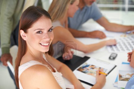 Photo for Magazine, design and portrait of woman in meeting with team project, collaboration and creative planning. Happy, person and photographer work at table with catalog, portfolio and editing process. - Royalty Free Image