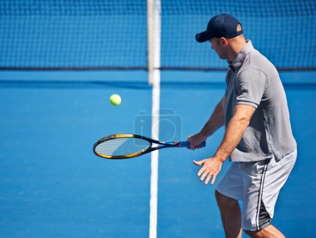 Photo for Athlete, man and tennis on court with serve, competition and performance outdoor with fitness and energy. Sport, player and ball on turf for training, exercise and racket with skill, game and hobby. - Royalty Free Image