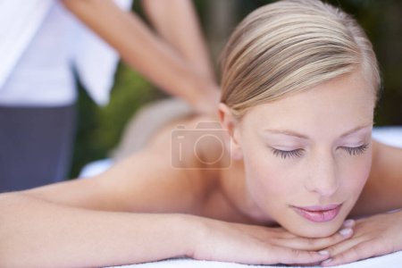 Photo for Woman, massage therapist and sleeping for treatment, back and spa for wellness and stress relief therapy. Face, masseuse and relaxing in resort, peaceful and hands for luxury bodycare and tranquility. - Royalty Free Image