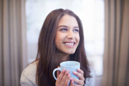 Photo for Happy woman, thinking and coffee in living room, future or daydream for inspiration and positivity in apartment. Smile, excited with tea and mindfulness with insight, ideas and drink espresso at home. - Royalty Free Image