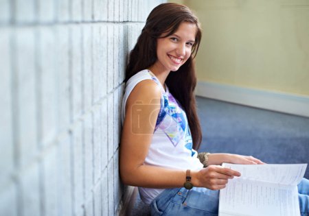 Photo for Student, woman and portrait and reading book for education, learning and knowledge in college. Young and smart person with textbook for college research, test or exam script and studying on floor. - Royalty Free Image