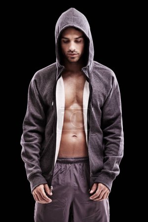Photo for Fashion, body or fitness man with hoodie, jacket or gym, clothes or style choice in studio on black background. Exercise, chest and confident, muscular or active model with comfortable workout outfit. - Royalty Free Image