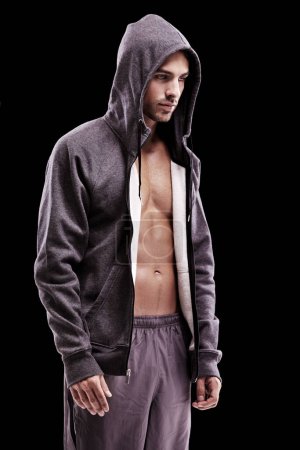Photo for Fashion, body and fitness man in studio with hoodie, jacket or gym, clothes or style choice on black background. Exercise, chest or profile of confident male model with comfortable workout outfit. - Royalty Free Image
