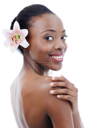 Photo for Black woman, skin and flower in portrait, beauty and wellness with dermatology and nature on white background. Orchid, eco friendly cosmetics and body care with natural and clean skincare in studio. - Royalty Free Image
