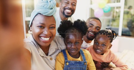 Photo for Black family, selfie and a smile of parents and children together for bonding, love and care. Face of an African woman, man and happy kids at home for a picture, quality time and bonding or fun. - Royalty Free Image