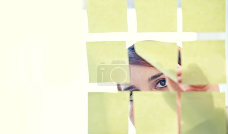 Photo for Employee, sticky notes and glass wall for planning, thinking and vision for logistics and ideas. Businesswoman, brainstorming and mockup for meeting, goals and teamwork for project management. - Royalty Free Image