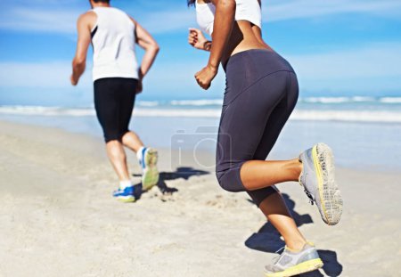 Photo for Couple, sea and fitness with running, training and exercise for race in summer by the beach. Legs, athlete and workout of people by the ocean in Miami for health and wellness outdoor for sport. - Royalty Free Image