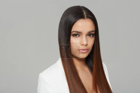 Photo for Portrait, beauty and hair with natural woman in studio isolated on gray background for shampoo treatment. Face, aesthetic and salon with confident young model at hairdresser for keratin haircare. - Royalty Free Image