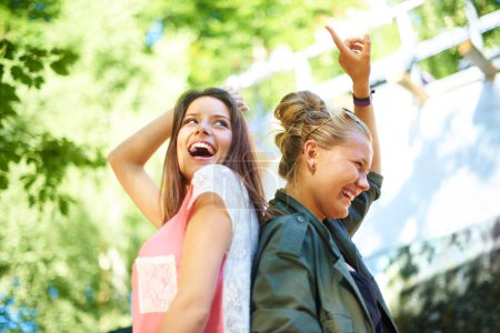 Photo for Friends, excited and women dance at music festival outdoor, bonding and having fun together at summer event. Laughing, happy and girls moving at party for celebration, carnival or concert in nature. - Royalty Free Image