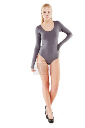 Photo for Fashion, portrait and woman in leotard on studio, white background and mockup in swimwear. Confidence, pride and person in bodysuit for lingerie, underwear or swimsuit with high heels and style. - Royalty Free Image