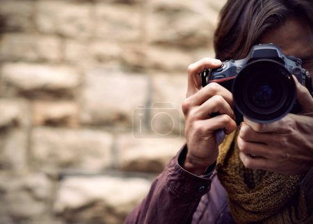 Photo for Travel, photographer and man in city for work, journey and filming memory of adventure with camera. Professional, cameraman and person capture creative photography with lens outdoor in photoshoot. - Royalty Free Image