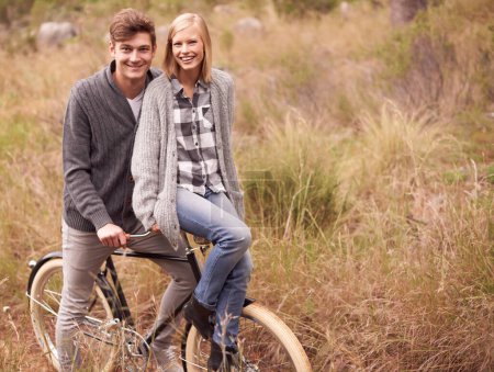 Photo for Couple, portrait and field with retro bicycle on holiday, adventure or date with sustainable transport. Man, woman and vintage bike with smile for vacation with journey in nature, path or environment. - Royalty Free Image