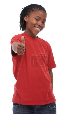 Photo for Boy, child and portrait with smile and thumbs up for yes or feedback, review and OK on white background. Support, vote and happy, hand gesture or like emoji in studio with thanks you or praise. - Royalty Free Image