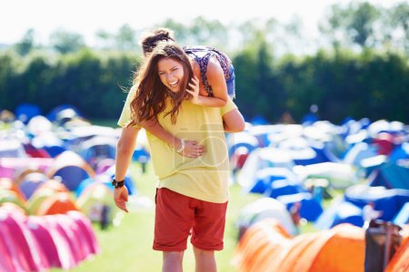 Photo for Love, tent and carrying with couple laughing together outdoor on campsite for travel or vacation. Comic, nature or forest with funny young man and woman walking on grass for summer camping holiday. - Royalty Free Image