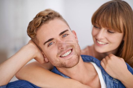 Photo for Closeup, couple and together in house with smile on date and romance to enjoy. Man, love and hug by partner, cute and moment with pride on face and lovers in relationship with happiness in life. - Royalty Free Image