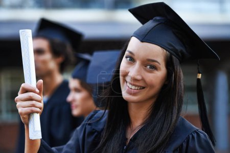 Photo for Woman, student and portrait at graduation, scroll and university success or achievement. Female person, smile and pride at outdoor ceremony, higher education and degree or diploma for credential. - Royalty Free Image