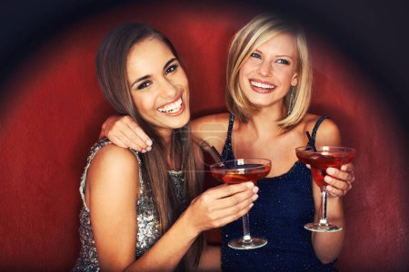 Photo for Happy, cocktails and portrait of women at event for party, bonding or happy hour together. Smile, confidence and young female friends with alcohol drinks at night club for celebration and fun - Royalty Free Image