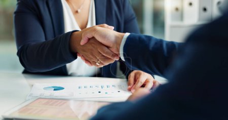 Photo for Business people, closeup and handshake for deal, agreement and partnership negotiation in office. Shaking hands, contract and hiring offer for recruitment, interview and financial analyst in meeting. - Royalty Free Image