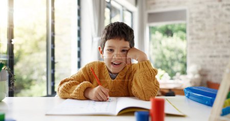 Photo for Home learning, education or face of kid in kindergarten studying for knowledge or growth development. Smile, portrait or happy child writing or counting on numbers to study for test in notebook alone. - Royalty Free Image