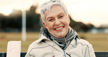 Photo for Face, senior woman and funny on park bench on vacation, holiday or travel in winter. Portrait, happy and elderly person in nature, outdoor or garden for laughing, freedom and retirement in Australia. - Royalty Free Image