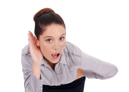 Business woman, listening and wow for gossip, news or confidential intel on a white background. Portrait of young employee with palm or hands cupping ears for whisper of rumor and shocked in studio.