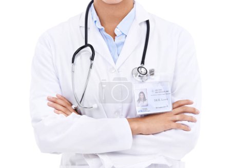 Photo for Doctor, hands or arms crossed in studio with confidence in medical career as cardiologist. Proud person, coat or body of medicine consultant with name tag or healthcare isolated on white background. - Royalty Free Image