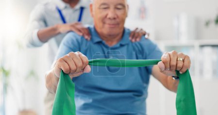 Photo for Resistance band, physical therapy and old man with physiotherapist, muscle training and strength with senior care. Health, wellness and people at physio clinic with rehabilitation and equipment. - Royalty Free Image