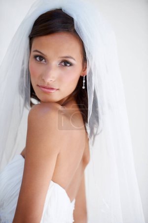 Photo for Wedding, portrait and bride with veil, makeup and fashion for celebration of marriage. Bridal, aesthetic and woman in gown for ceremony with beauty, cosmetics and confidence and pride in dress. - Royalty Free Image