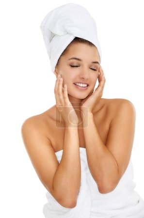 Photo for Towel, beauty studio and relax woman for morning routine, self care treatment or feeling collagen results. Bathroom, eyes closed and girl smile for skincare, hygiene or wellness on white background. - Royalty Free Image