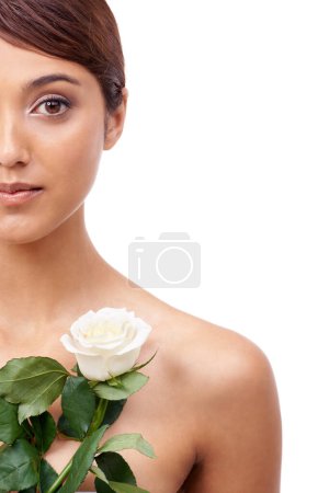 Photo for Woman, rose and beauty with half portrait, vegan and model for skincare cosmetics on white background. Makeup, wellness treatment or mockup with shine, flower or organic for glow with healthy skin. - Royalty Free Image